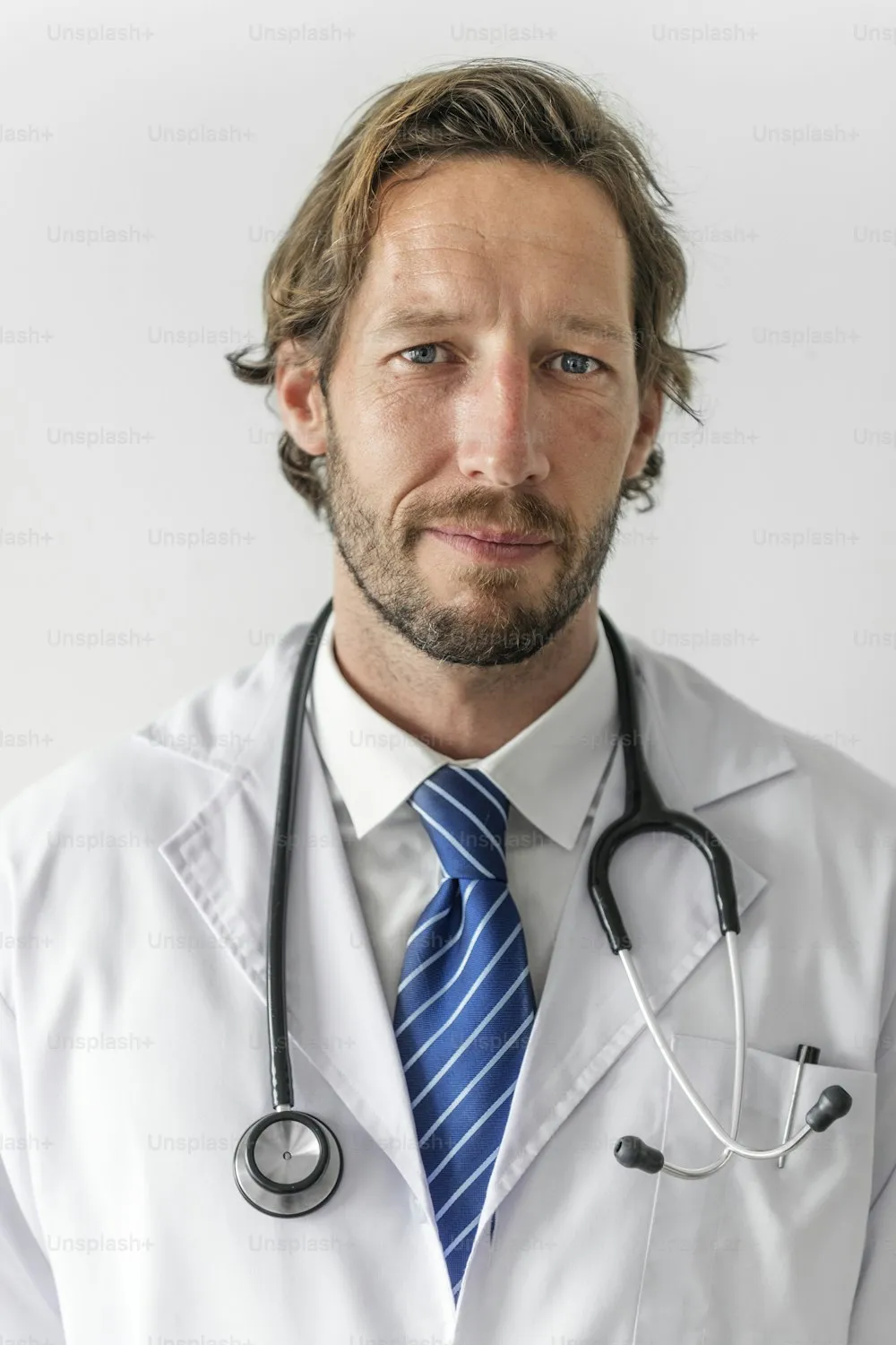 Portrait of a physician in medical attire with stethoscope